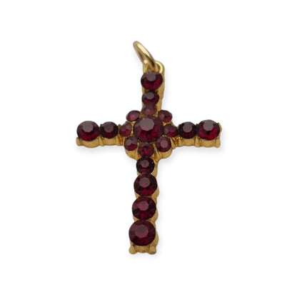 Vintage cross with garnet rhinestones and gold-tone metal religious style circa 1950