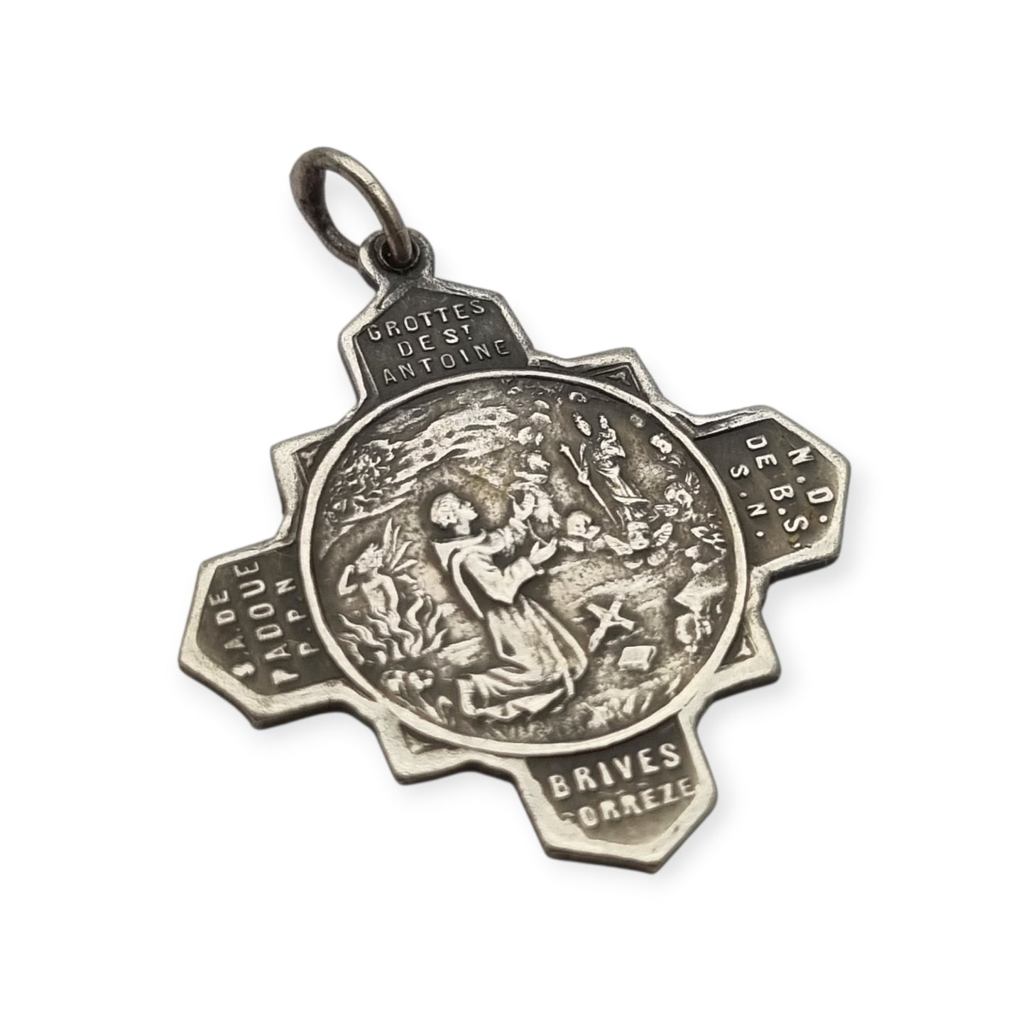 Catholic devotional silver-tone metal Saint Anthony of Padua cross medal, circa 1970