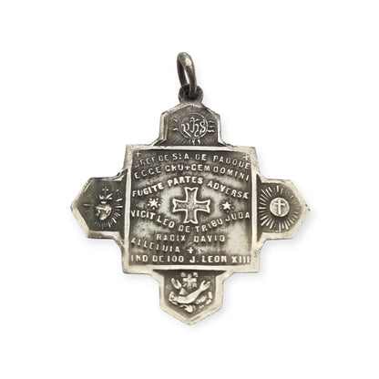 Catholic devotional silver-tone metal Saint Anthony of Padua cross medal, circa 1970
