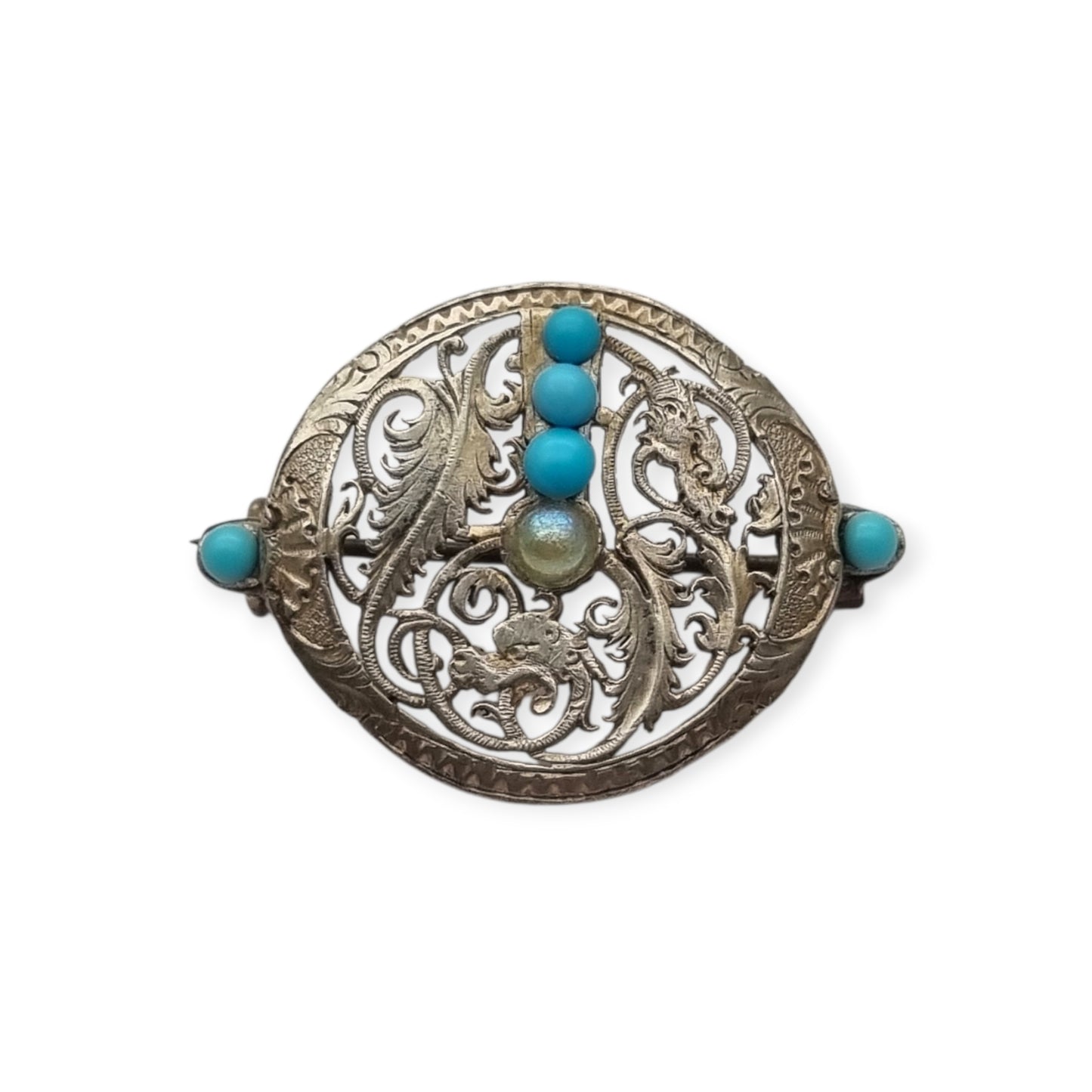 Broche vintage boho étnico de plata con cuentas azules y calado vegetal, años 70-80
