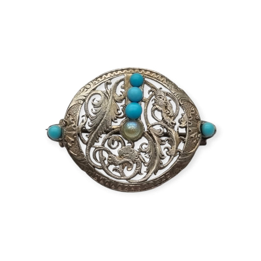 Broche vintage boho étnico de plata con cuentas azules y calado vegetal, años 70-80