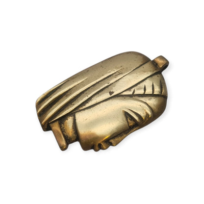Gran colgante escultórico de bronce con cabeza femenina estilizada, circa 1980-1990