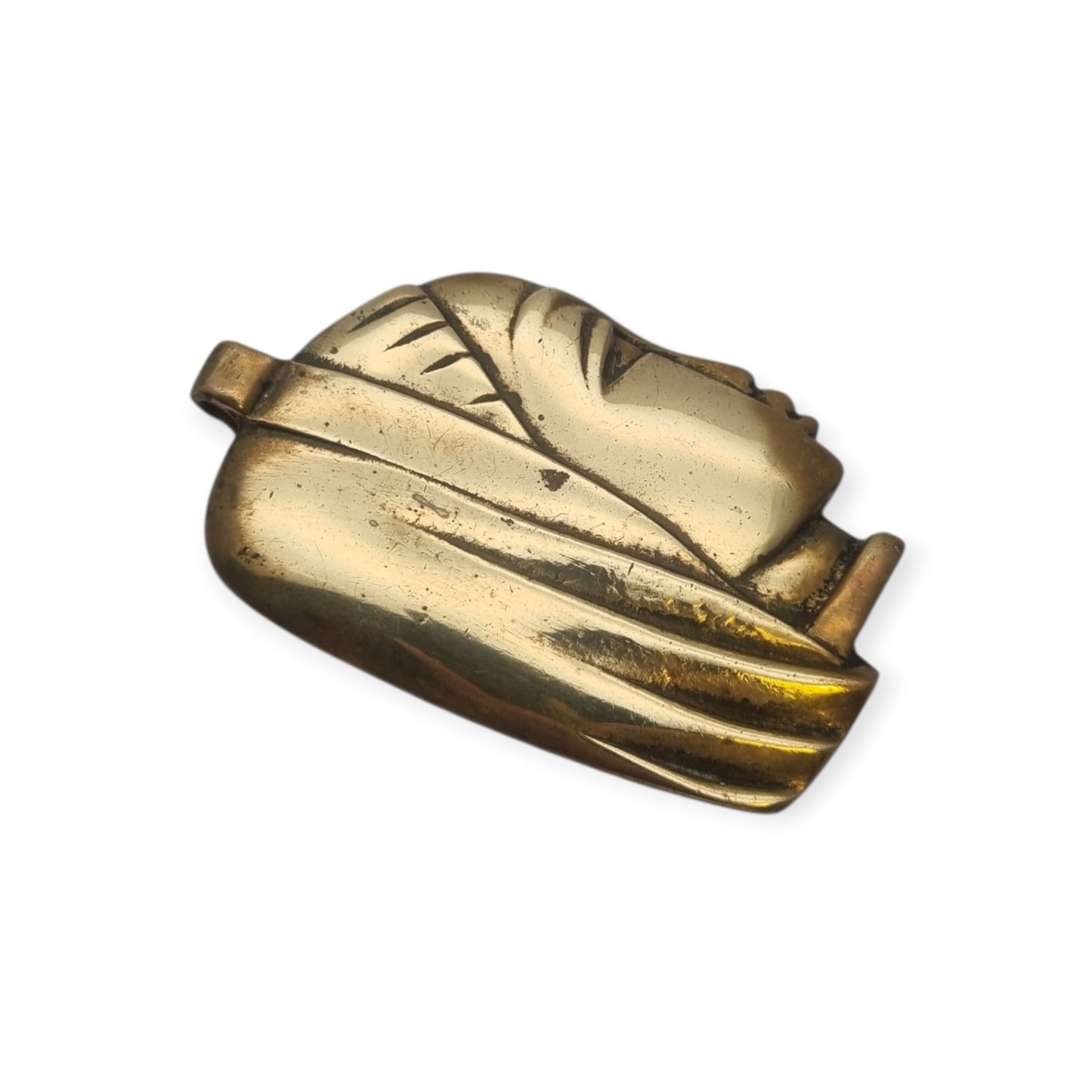 Gran colgante escultórico de bronce con cabeza femenina estilizada, circa 1980-1990