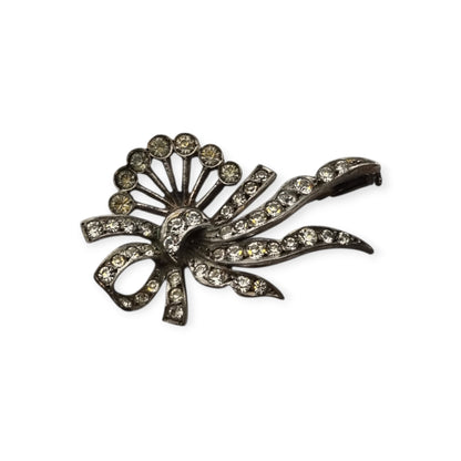 Antique Art Deco silver brooch with floral bouquet and white rhinestone bow circa 1930