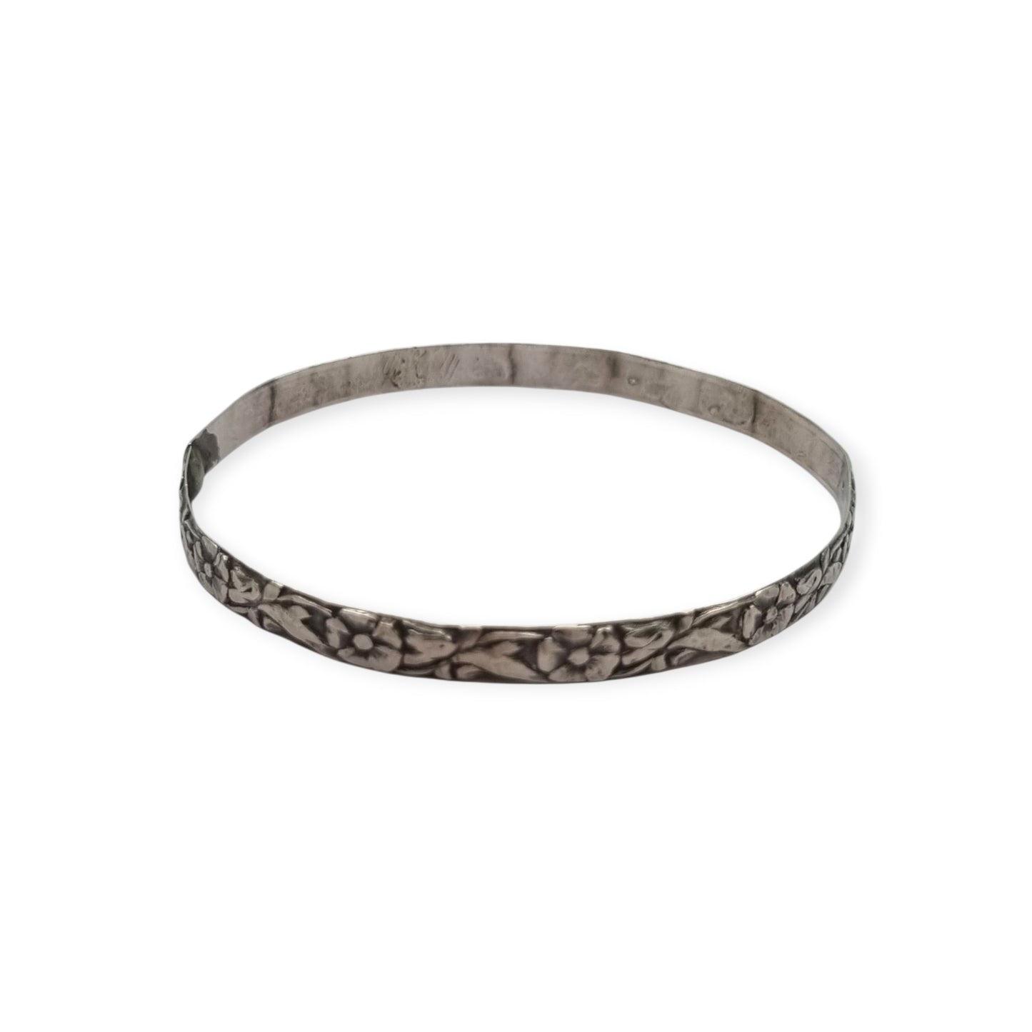 Vintage silver bracelet with embossed floral design circa 1950