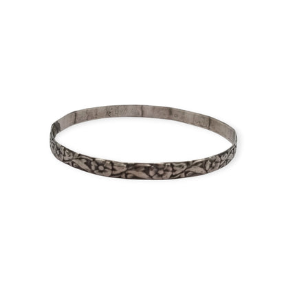 Vintage silver bracelet with embossed floral design circa 1950