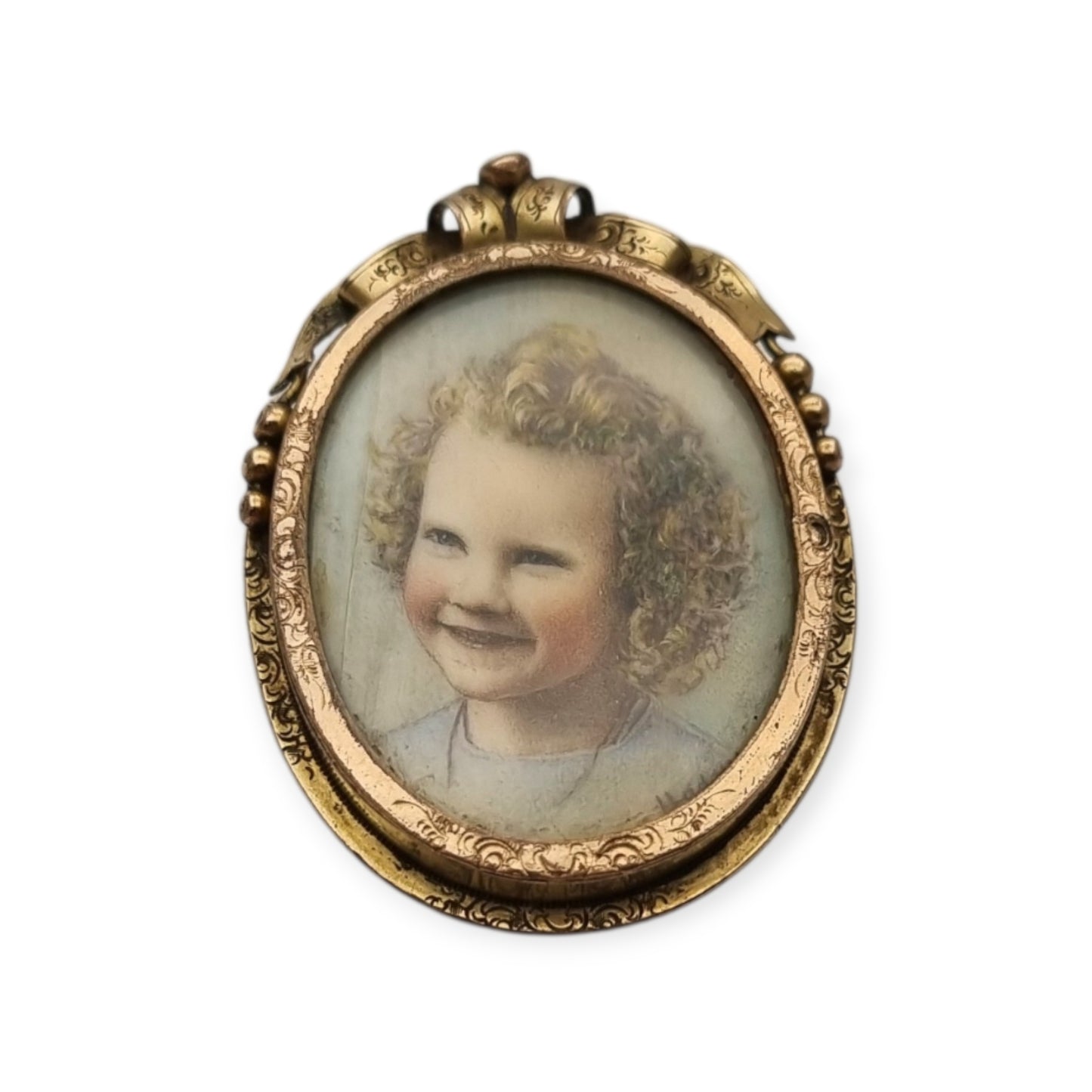 Belle Époque gilded metal locket brooch with Louis XV style miniature child portrait, circa 1890-1910