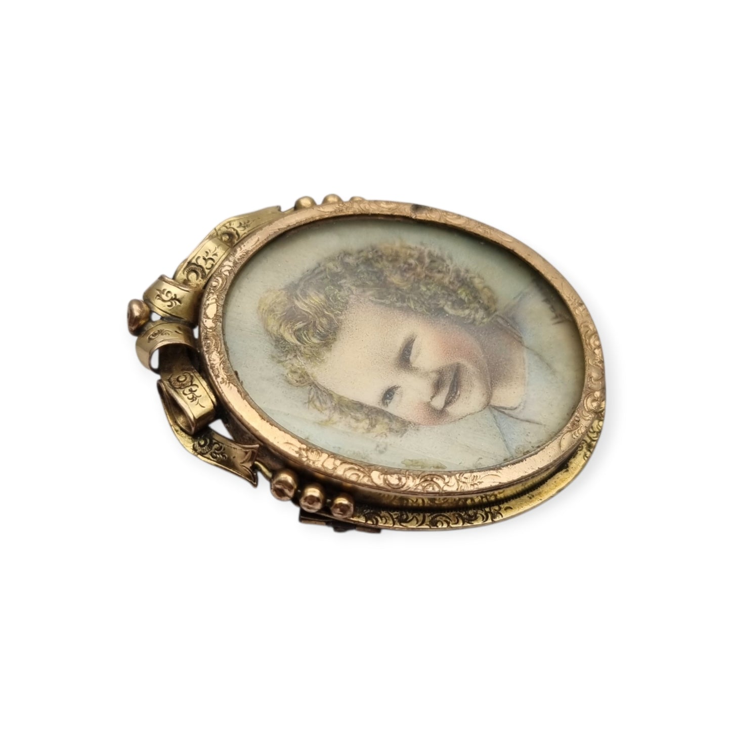 Belle Époque gilded metal locket brooch with Louis XV style miniature child portrait, circa 1890-1910