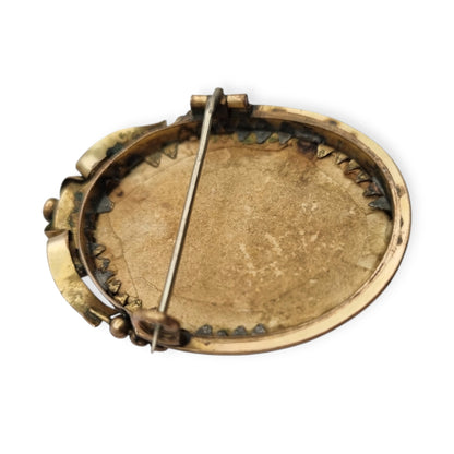 Belle Époque gilded metal locket brooch with Louis XV style miniature child portrait, circa 1890-1910
