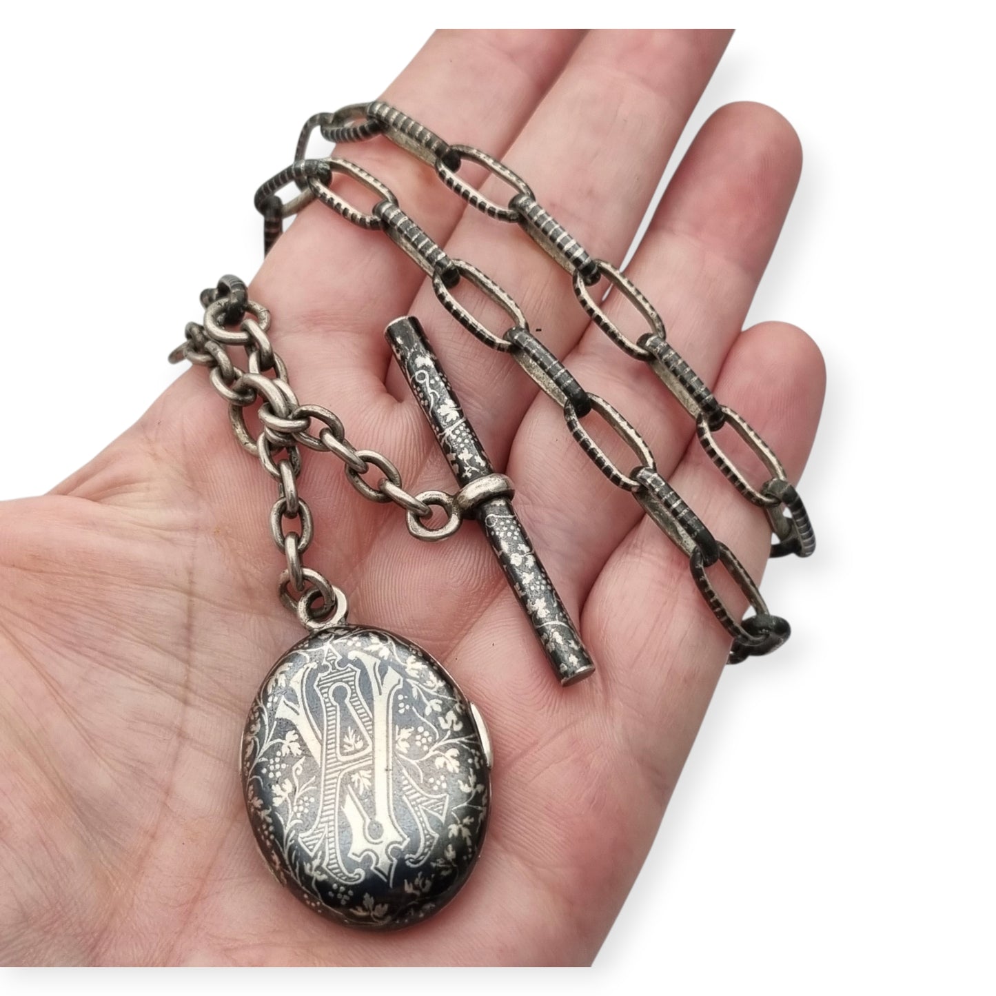 Antigua Cadena Albert completa de plata nielada para reloj de bolsillo con guardapelo monogramado  circa 1890