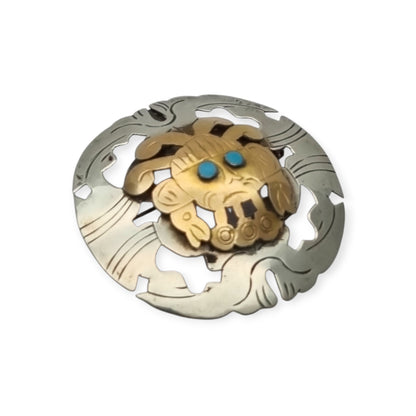 Broche colgante peruano de plata 925 y oro 18K con máscara precolombina y cabujones de turquesa, circa 1965–1975