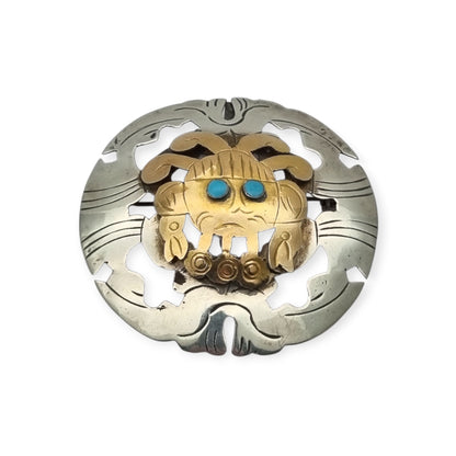 Broche colgante peruano de plata 925 y oro 18K con máscara precolombina y cabujones de turquesa, circa 1965–1975