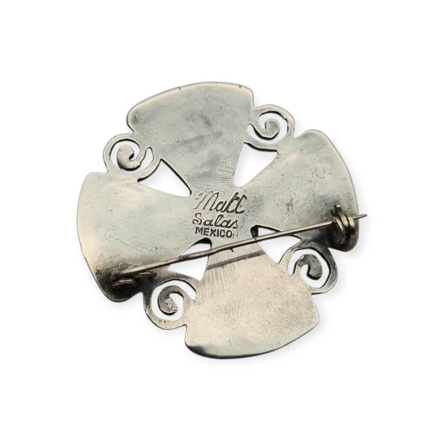 Broche cruciforme mexicano MATL SALAS en plata con turquesa, coral y amatista, joyería de autor, ca. 1960