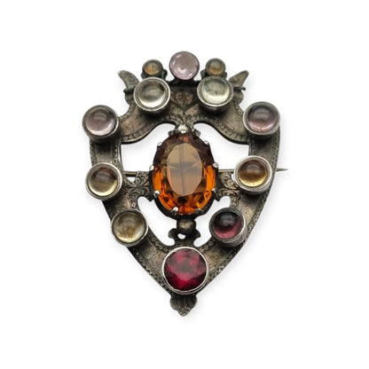 Victorian Scottish Luckenbooth brooch in silver with polychrome and Cairngorm quartzes, registered design 1866