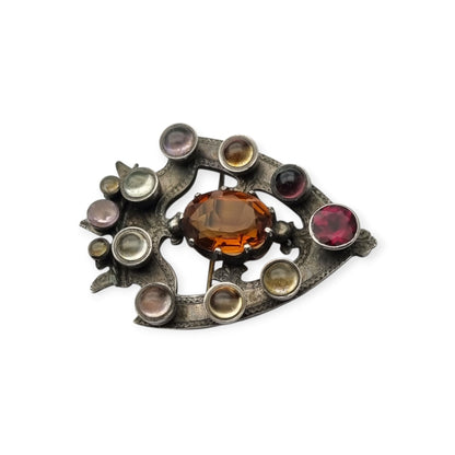 Victorian Scottish Luckenbooth brooch in silver with polychrome and Cairngorm quartzes, registered design 1866