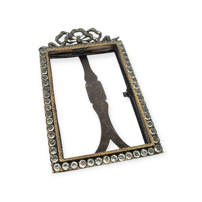Belle Époque photo frame with glass panels and a Louis XVI bow, likely French, ca. 1890–1910