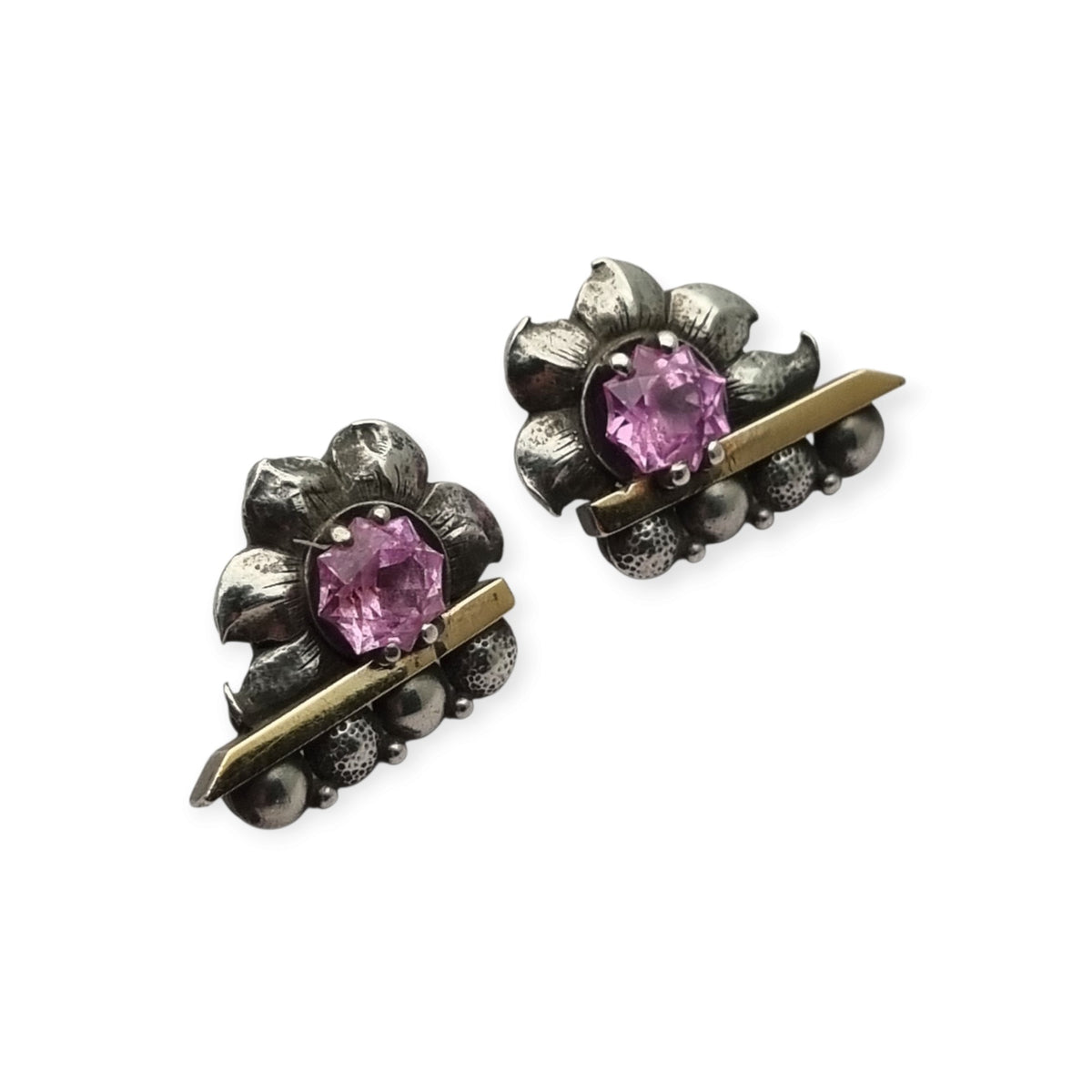 Art Deco silver earrings with gold accents and faceted pink stones, circa 1930–1940