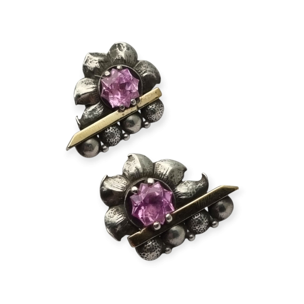 Art Deco silver earrings with gold accents and faceted pink stones, circa 1930–1940