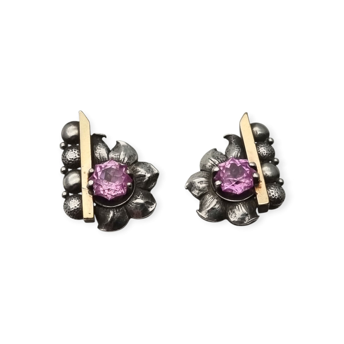 Art Deco silver earrings with gold accents and faceted pink stones, circa 1930–1940