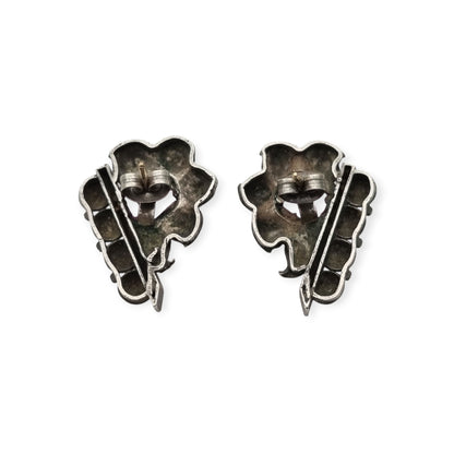 Art Deco silver earrings with gold accents and faceted pink stones, circa 1930–1940