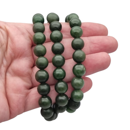 Long vintage nephrite green jade necklace with spherical beads Circa 1950