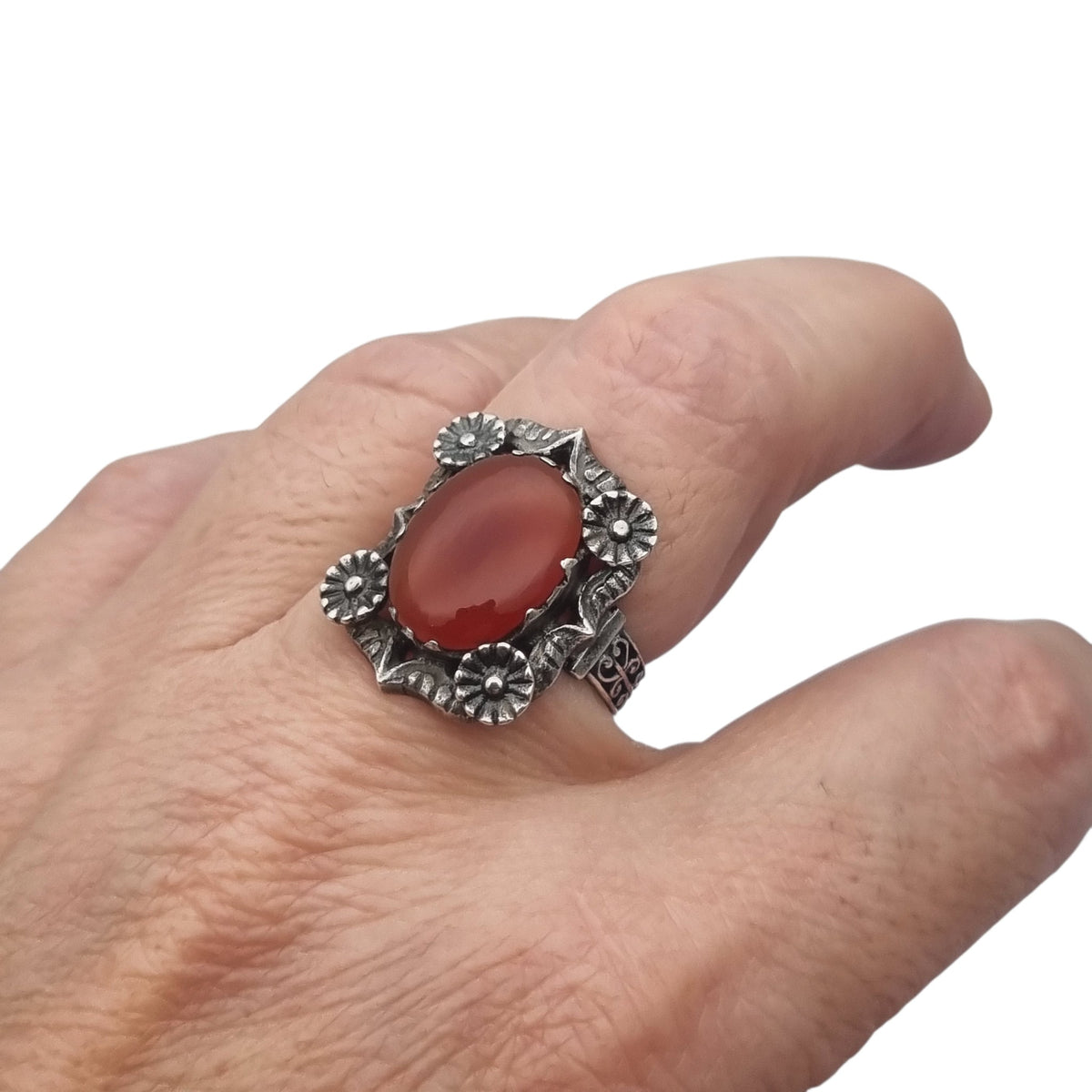 Antique Art Deco silver and carnelian ring with floral decoration, France 1950s