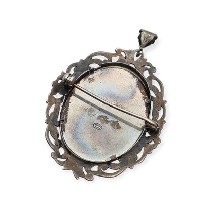 Broche colgante Art Nouveau de plata 800 con miniatura de dama y marco floral, Europa, ca. 1900–1930