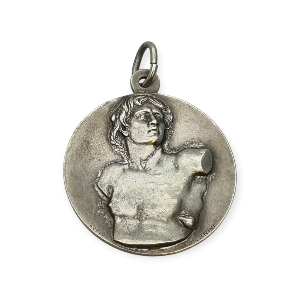 Vintage relic medal of Saint Sebastian from the Catacombs of Rome with early Christian symbols, Italy, ca. 1950–1960