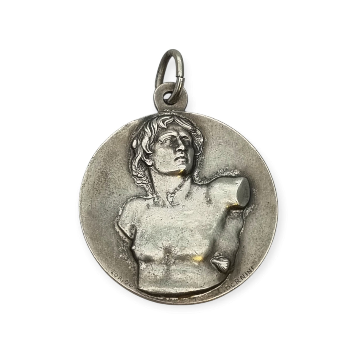 Vintage relic medal of Saint Sebastian from the Catacombs of Rome with early Christian symbols, Italy, ca. 1950–1960