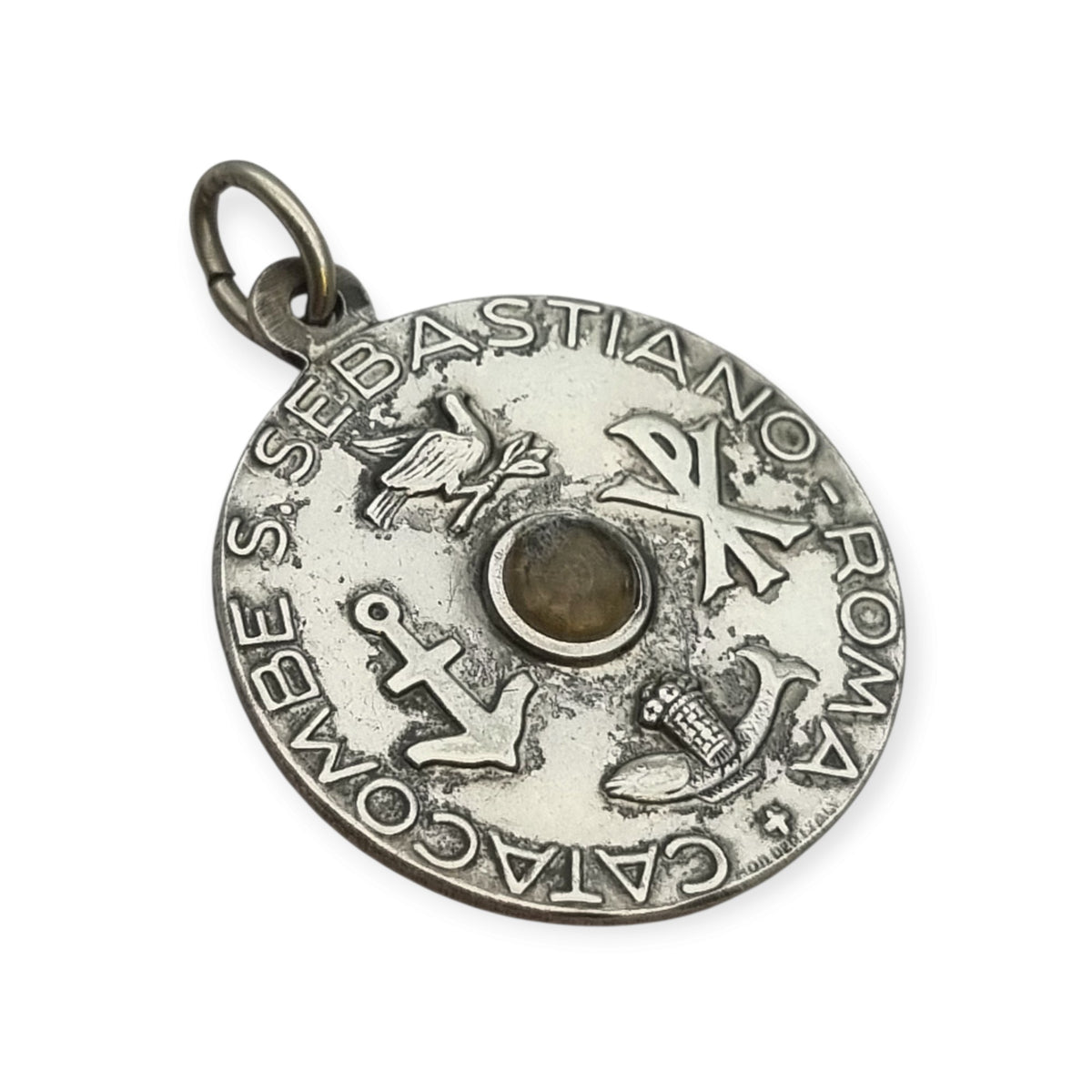Vintage relic medal of Saint Sebastian from the Catacombs of Rome with early Christian symbols, Italy, ca. 1950–1960