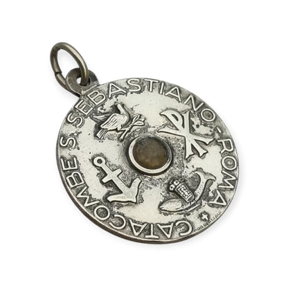 Vintage relic medal of Saint Sebastian from the Catacombs of Rome with early Christian symbols, Italy, ca. 1950–1960