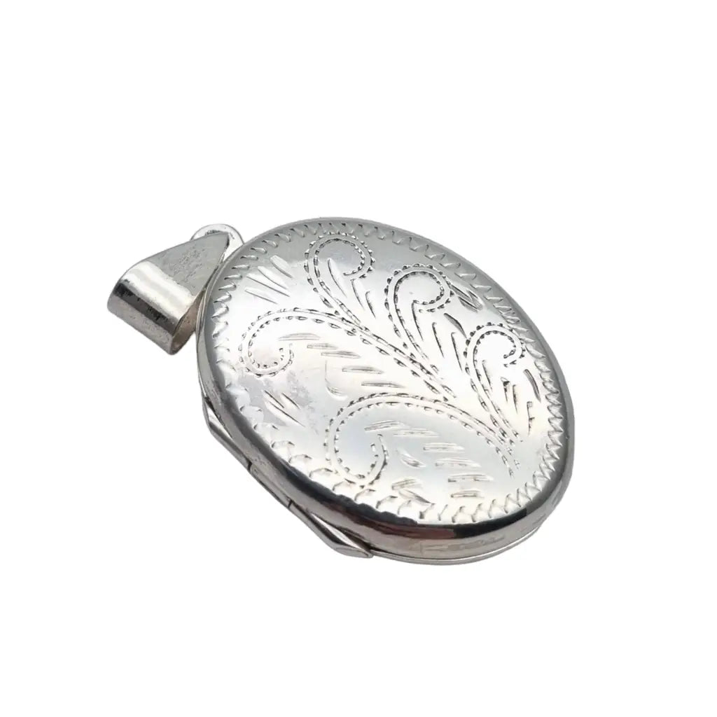 Medallón en forma de óvalo plata ley antigua vintage portafotos colgante