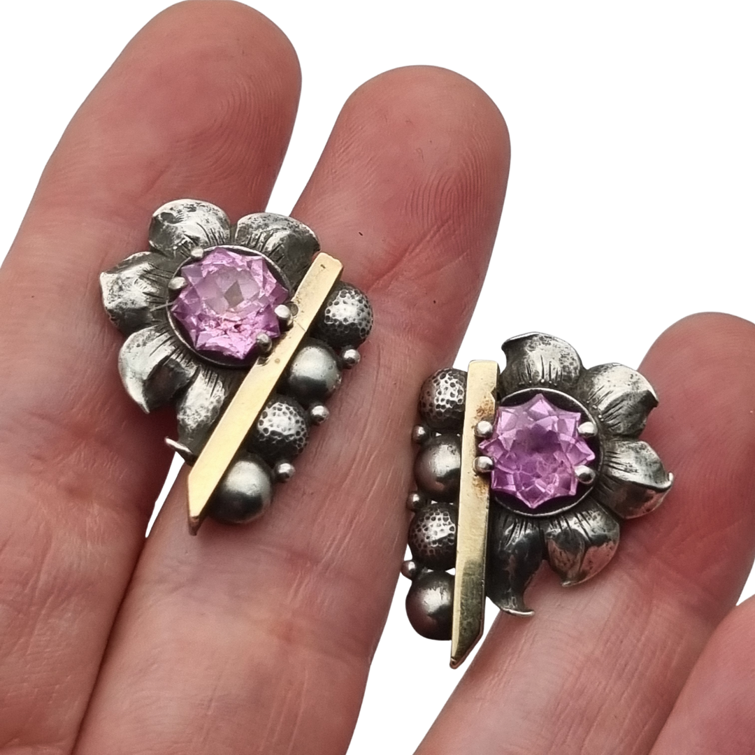 Art Deco silver earrings with gold accents and faceted pink stones, circa 1930–1940