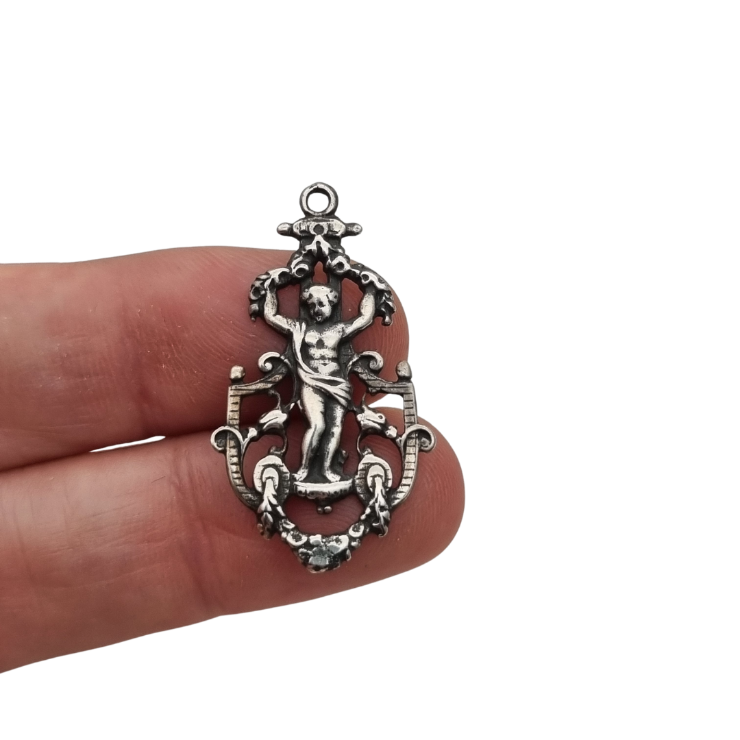 Pendant with putto in openwork 925 silver, Neo-Baroque inspiration, contemporary manufacture