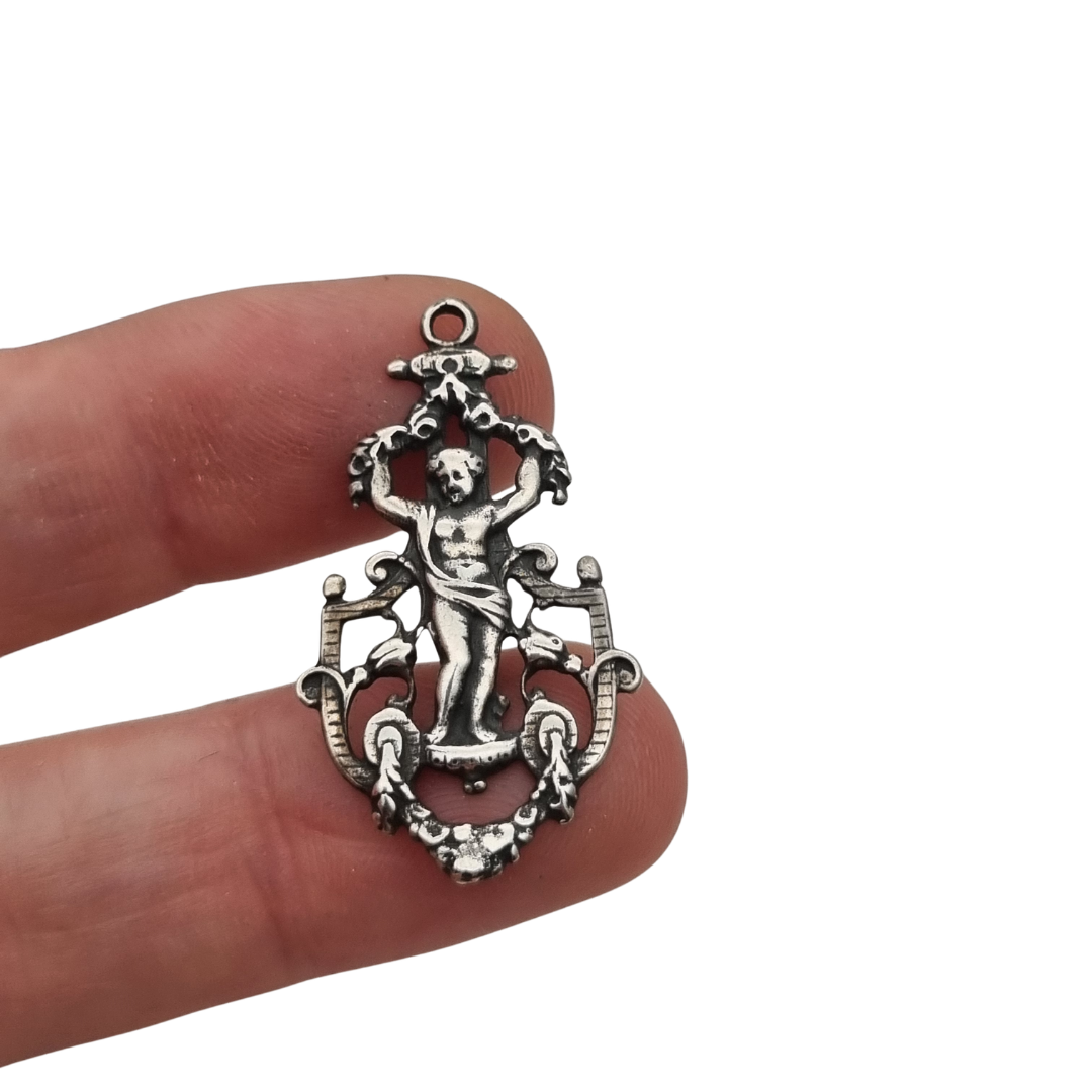 Pendant with putto in openwork 925 silver, Neo-Baroque inspiration, contemporary manufacture