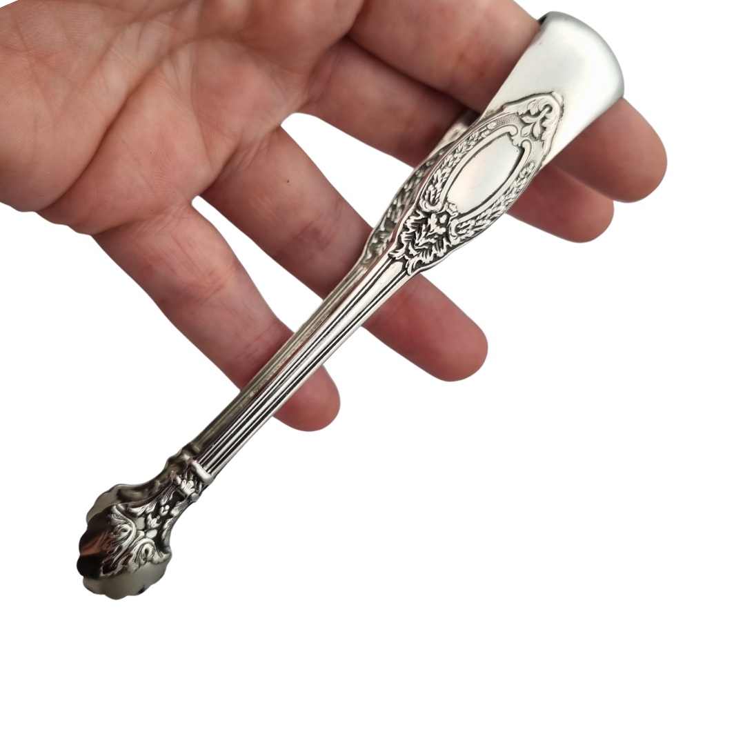 Pinzas para azúcar de plata francesa estilo rococó, plata 800, inicios siglo XX