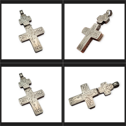 Antique Byzantine-style silver reliquary cross with engraved religious scenes.