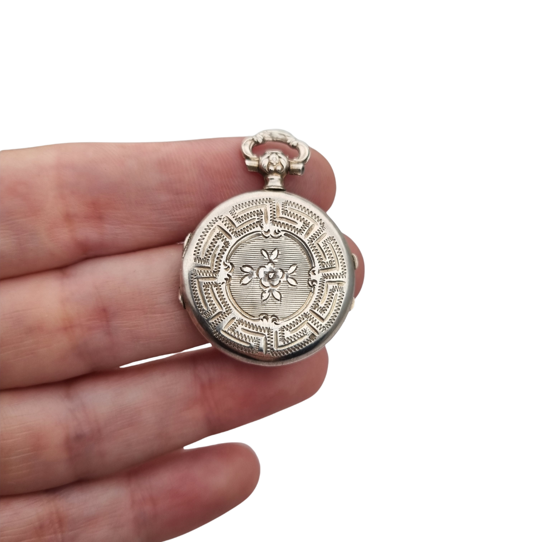 Victorian silver locket with European floral engraving, circa 1910