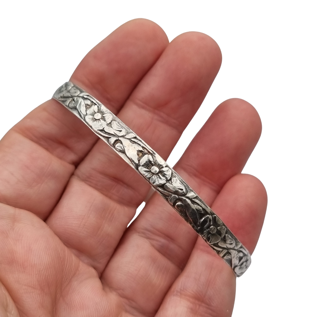 Vintage silver bracelet with embossed floral design circa 1950