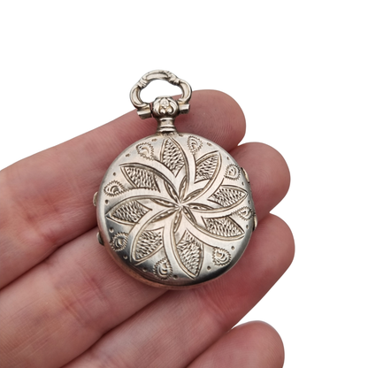 Victorian silver locket with European floral engraving, circa 1910