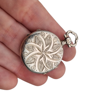 Victorian silver locket with European floral engraving, circa 1910