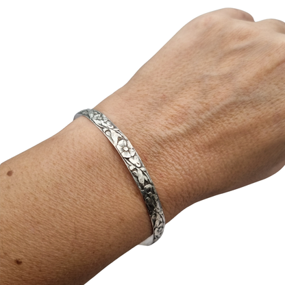 Vintage silver bracelet with embossed floral design circa 1950