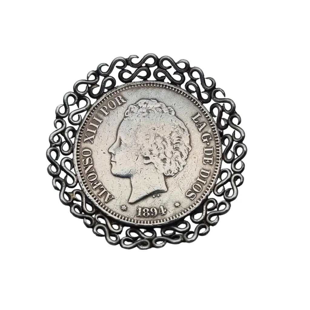 Joyas con monedas de plata broche