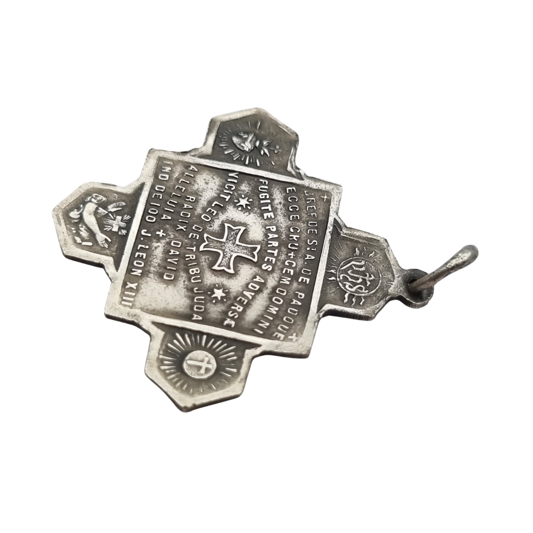Catholic devotional silver-tone metal Saint Anthony of Padua cross medal, circa 1970
