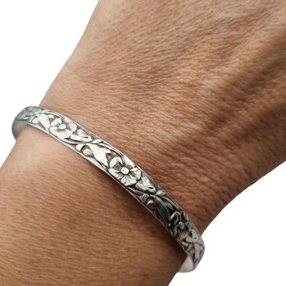 Vintage silver bracelet with embossed floral design circa 1950