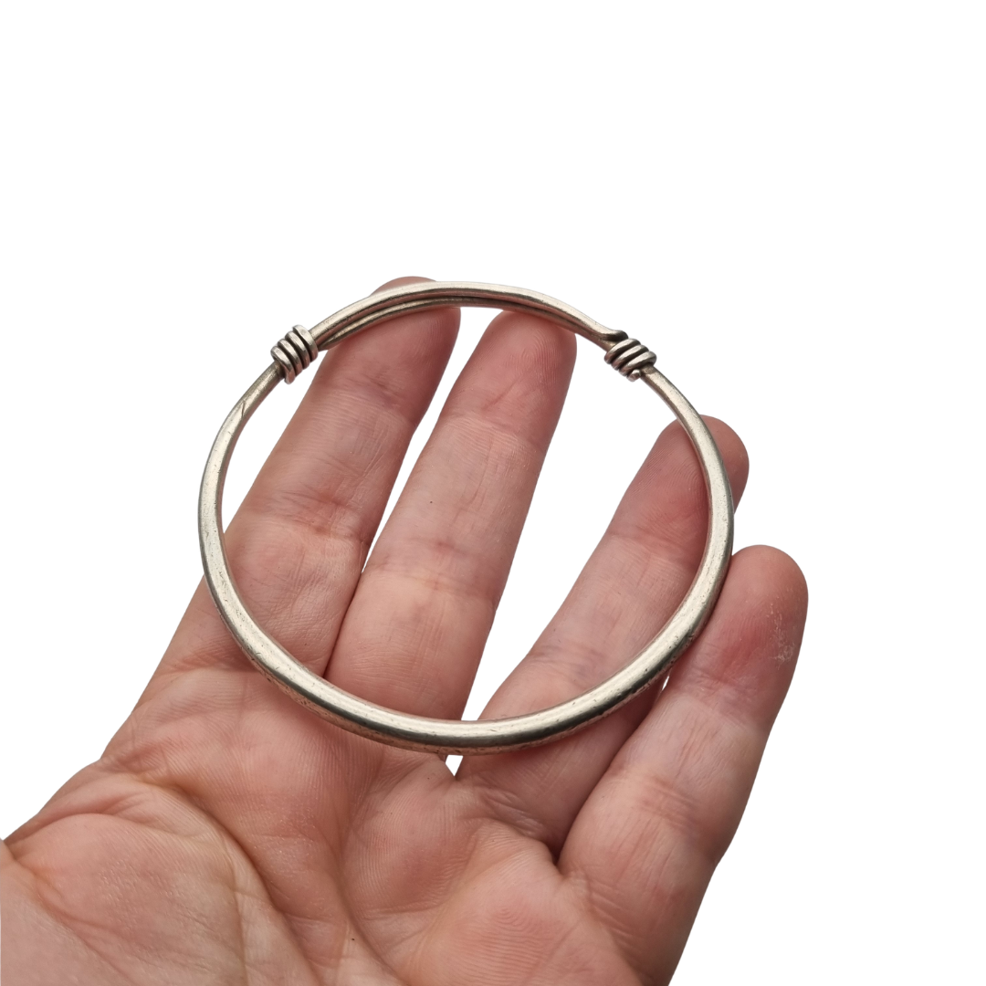 Vintage ethnic silver African knot bracelet, rigid artisan tribal bangle, 20th century