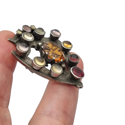 Victorian Scottish Luckenbooth brooch in silver with polychrome and Cairngorm quartzes, registered design 1866