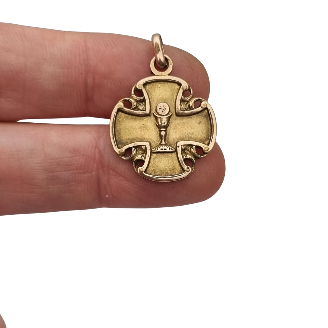 Antique religious medal in openwork gilt cross with chalice, circa 1920
