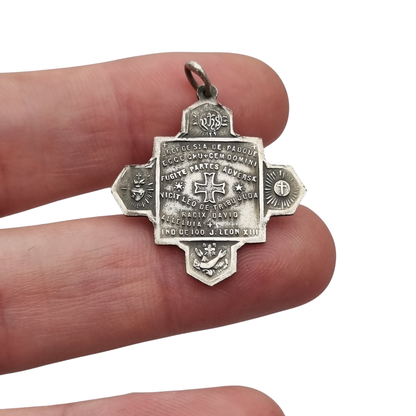 Catholic devotional silver-tone metal Saint Anthony of Padua cross medal, circa 1970