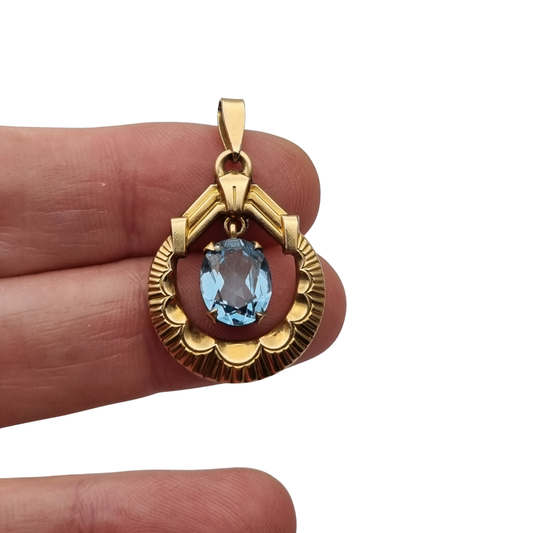 Colgante francés FIX Art Déco en oro laminado con piedra azul facetada, circa 1930–1940